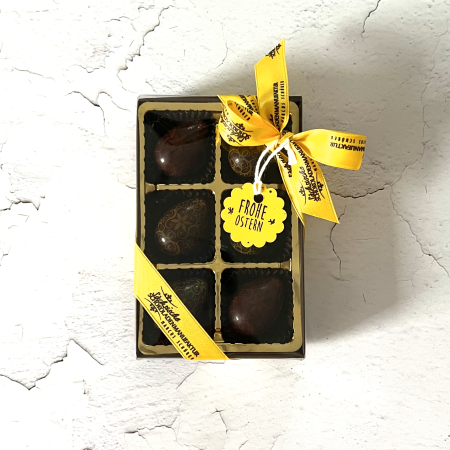 6 Designeier dunkel mit Nußnougat Erdbeer/Minze gefüllt