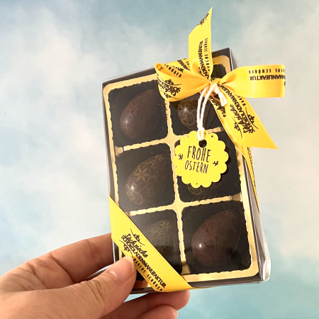 Preview: 6 Designeier dunkel mit Nußnougat Erdbeer/Minze gefüllt