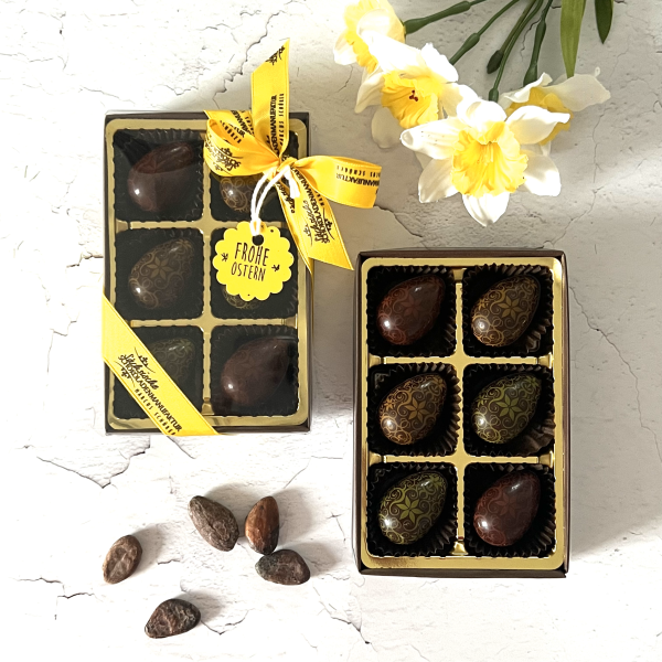 6 Designeier dunkel mit Nußnougat Erdbeer/Minze gefüllt